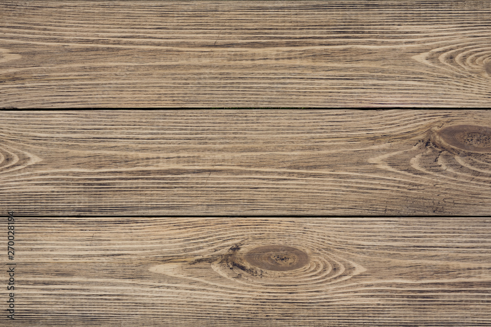 Rustic brown painted wooden board. Abstract pattern.