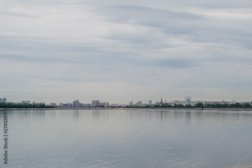Center of Kazan, reflected in the waters of Volga river. Russia Center of Kazan, reflected in the waters of Volga river. Russia