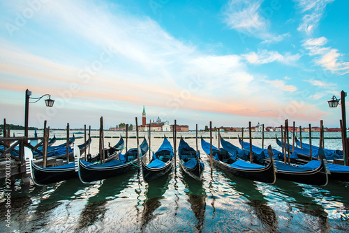 Mystical landscape with gondolas on the Grand Canal on the background of  Church of San Giorgio Maggiore in Venice, Italy, Europe. © anko_ter