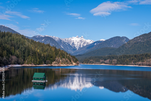 Mountain Lake with Blue Sky in British Columbia, Canada. © karamysh