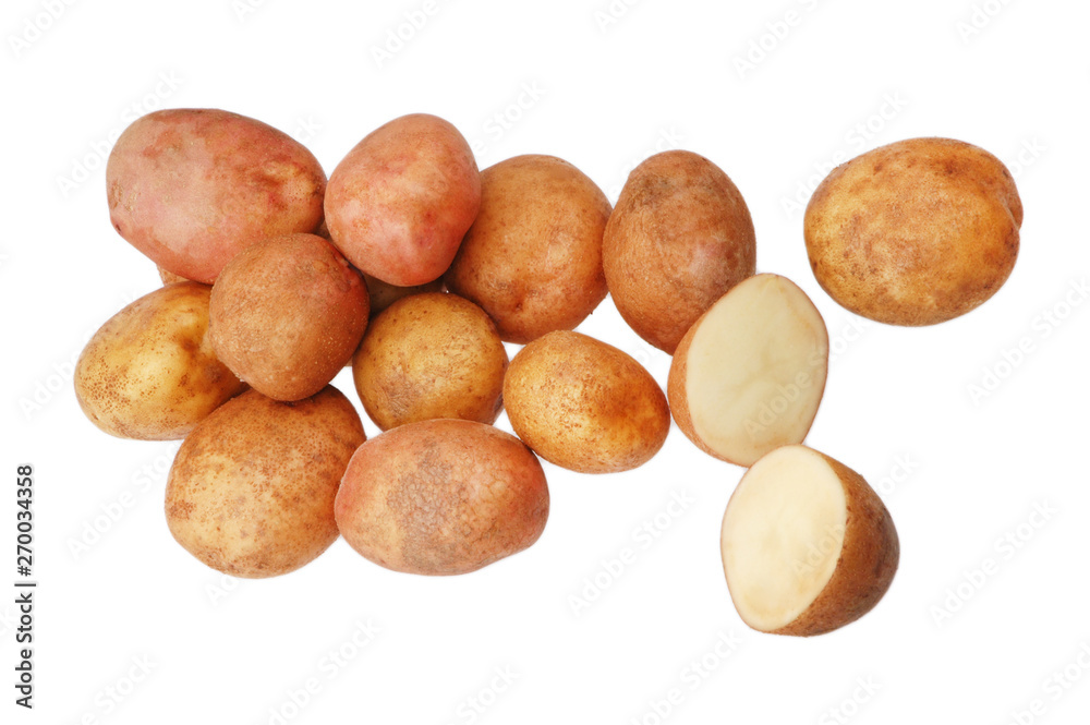 A lot of raw potatoes on a white isolated background A lot of raw potatoes on a white isolated background