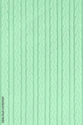 Trendy mint colored Knitwear Fabric Texture with Pigtails and stripes. Repeating Machine Knitting Texture of Sweater. Knitted Background. Color of the year 2020