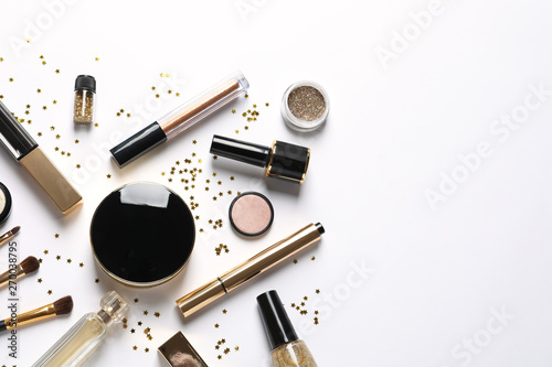 Set of luxury makeup products on white background, flat lay