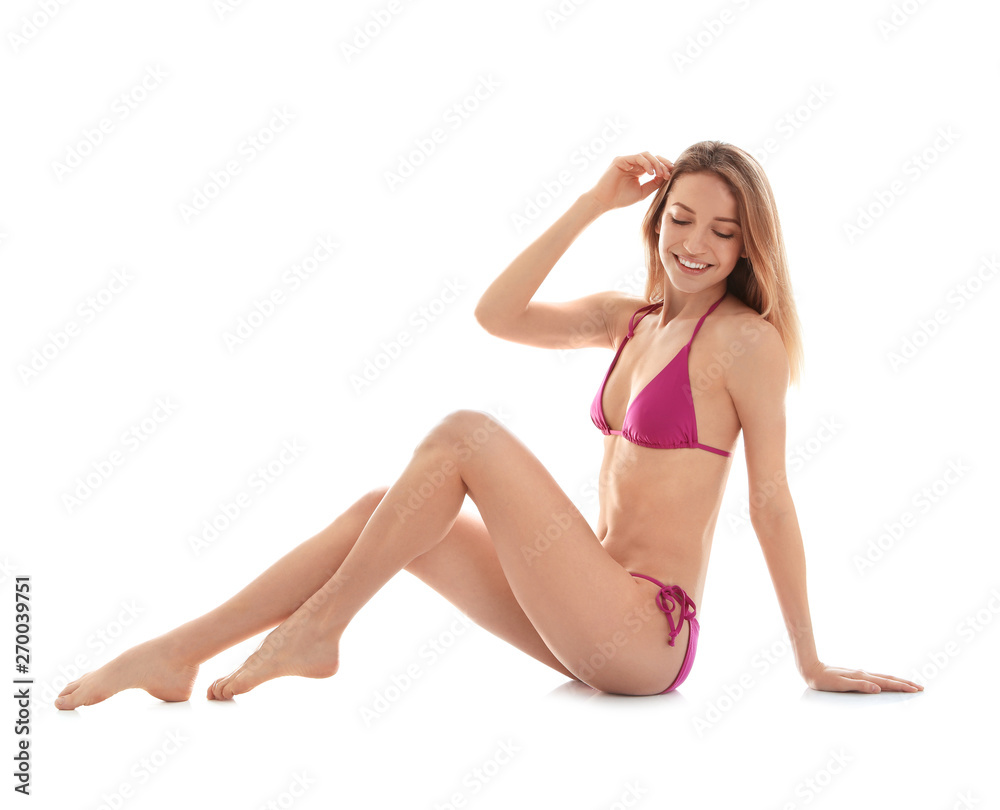 Young slim woman in bikini on white background. Perfect body Young slim woman in bikini on white background. Perfect body