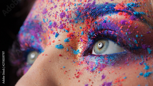Valokuva Explosion of color, bright creative makeup, colorful eyeshadow.