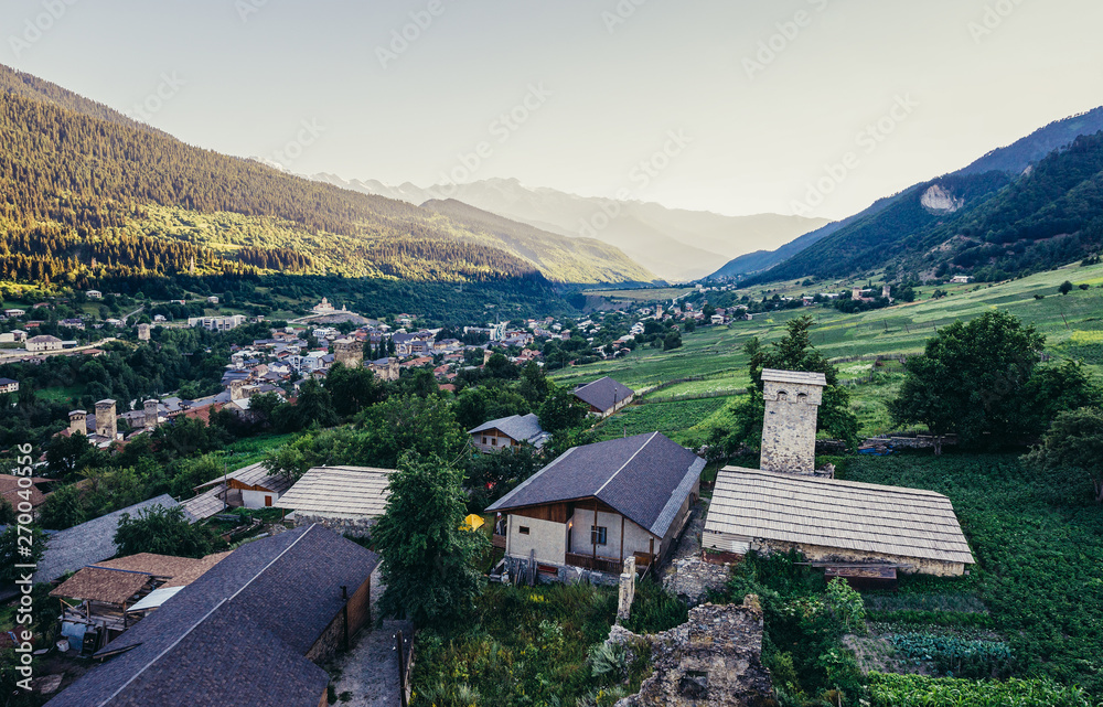Obraz premium Aerial view of Mestia highland townlet in Svaneti region, famous for its characteristic tower structures, Georgia