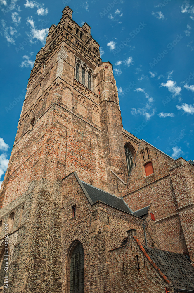 Brick walls and roofs from a church and blue sky