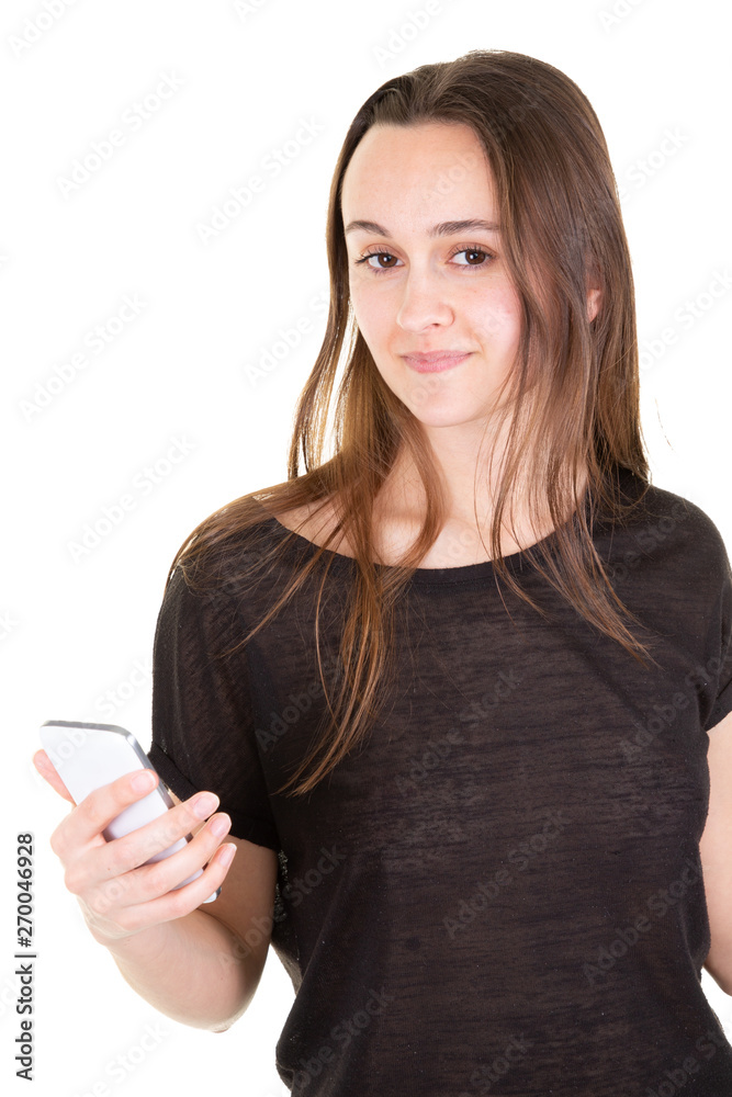 Young woman reading a message on smart phone in white background Young woman reading a message on smart phone in white background