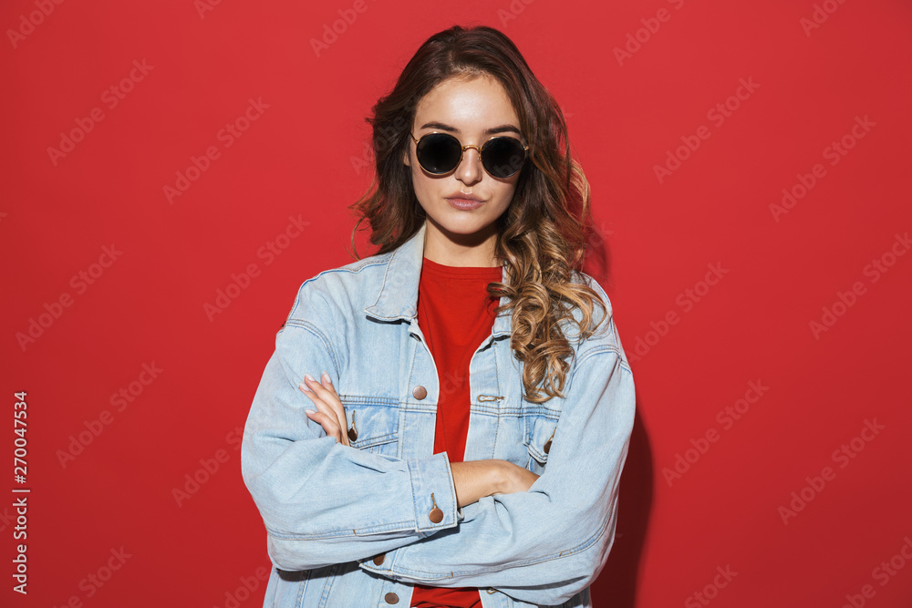 Portrait of a cheerful stylish young woman