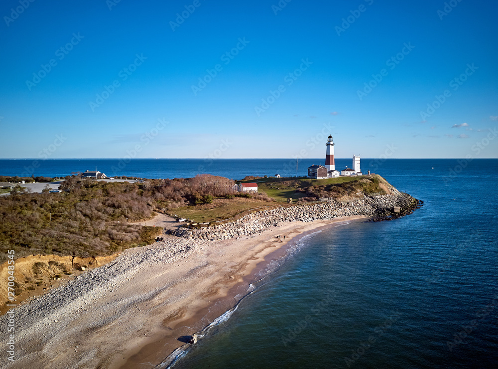 Montauk Lighthouse and beach aerial shot, Long Island, New York, USA.