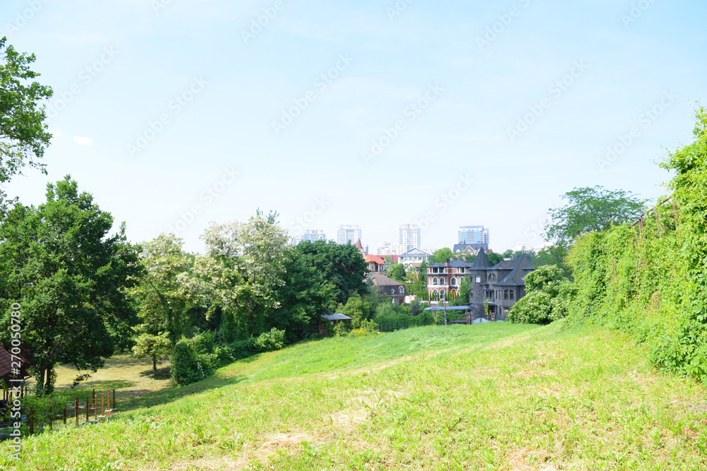 View of the green nature and the city in the distance. View of the green nature and the city in the distance.