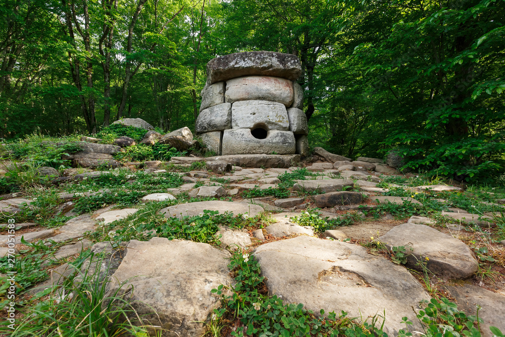 Ancient round compound dolmen in the valley of the river Jean, Monument of archeology megalithic structure. Ancient round compound dolmen in the valley of the river Jean, Monument of archeology megalithic structure.