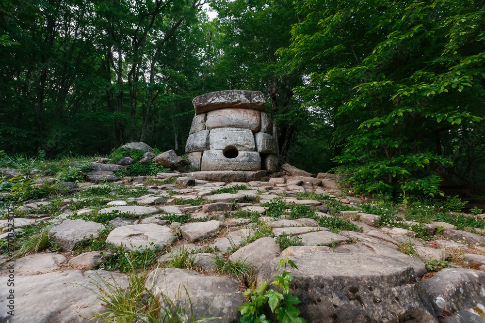 Ancient round compound dolmen in the valley of the river Jean, Monument of archeology megalithic structure. Ancient round compound dolmen in the valley of the river Jean, Monument of archeology megalithic structure.
