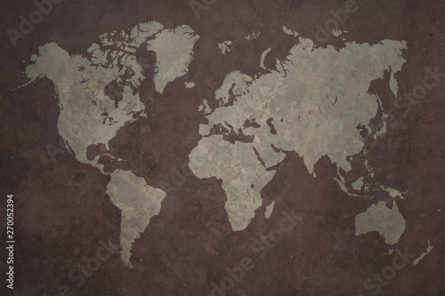 Grunge world map made with a planisphere overlaid with grungy elements  dark seas and light lands version