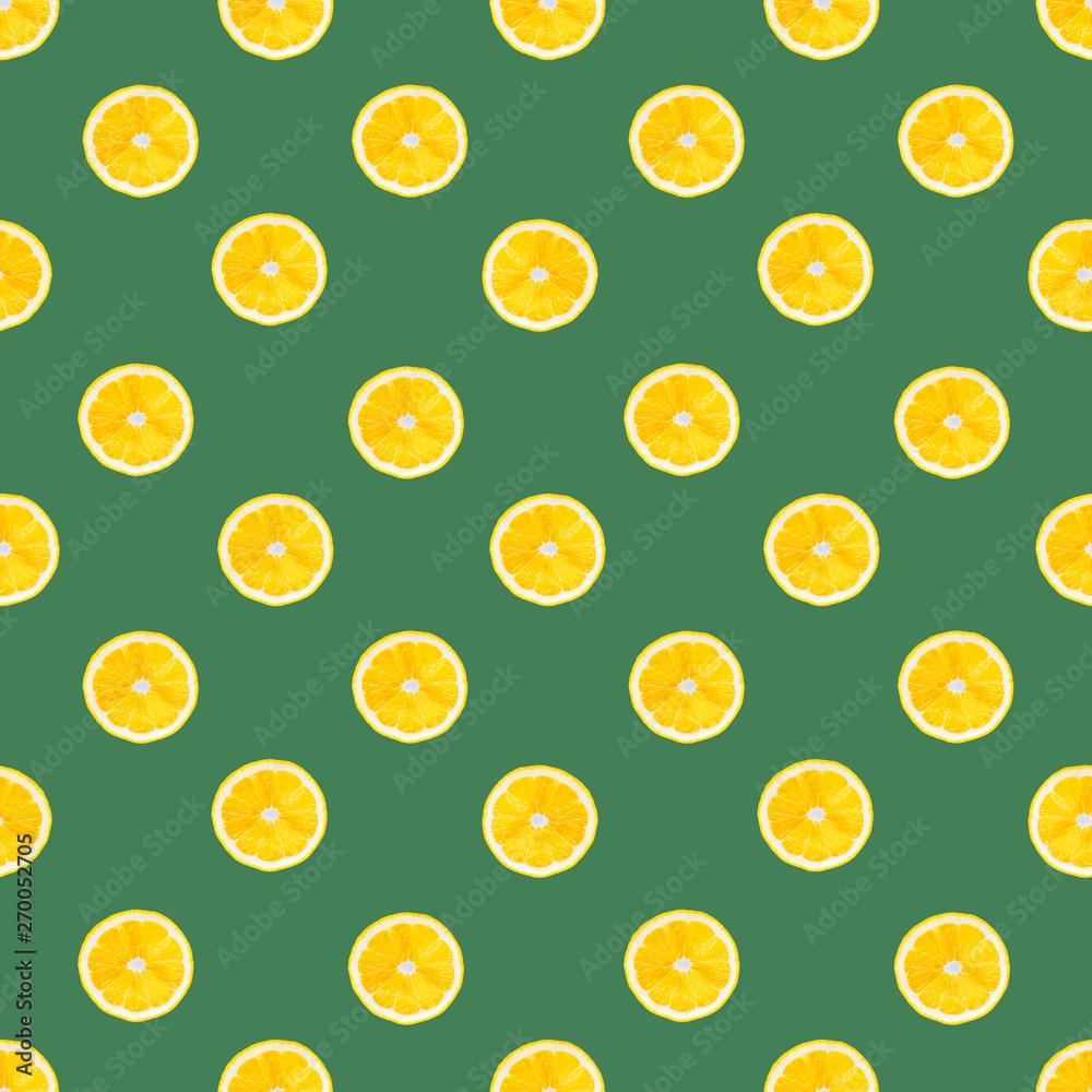 Summer seamless pattern with lemons slice on green background. Lemon texture design for textiles, wallpaper, fabric. Geometric ornament Summer seamless pattern with lemons slice on green background. Lemon texture design for textiles, wallpaper, fabric. Geometric ornament