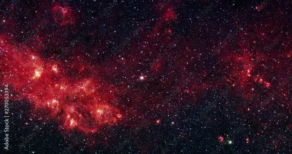 Deep space and the milkyway with a brightly glowing star in the centre as the camera zooms and rotates.