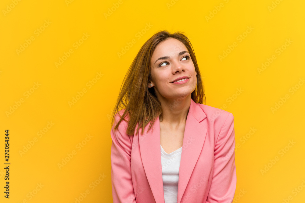 Young fashion business woman dreaming of achieving goals and purposes Young fashion business woman dreaming of achieving goals and purposes