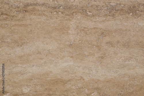 Wall of travertine with stone layers of different colors. Close up architecture macro photography. Creative wallpaper photography.