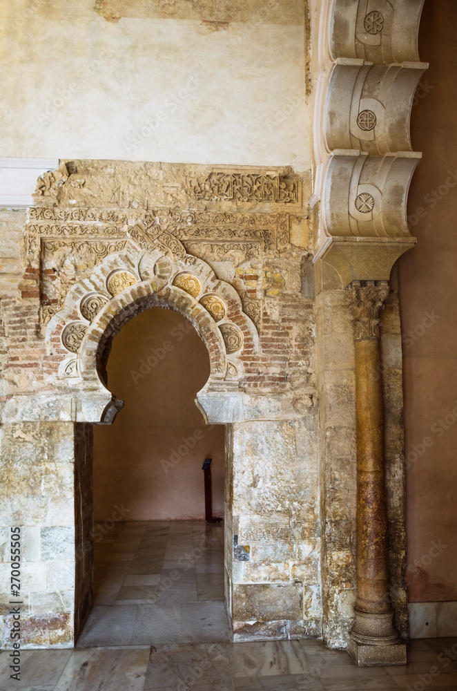 Fototapeta premium Zaragoza, Aragon, Spain - February 14th, 2019 : Door at the mosque of the Aljafería Palace Unesco World Heritage Site.