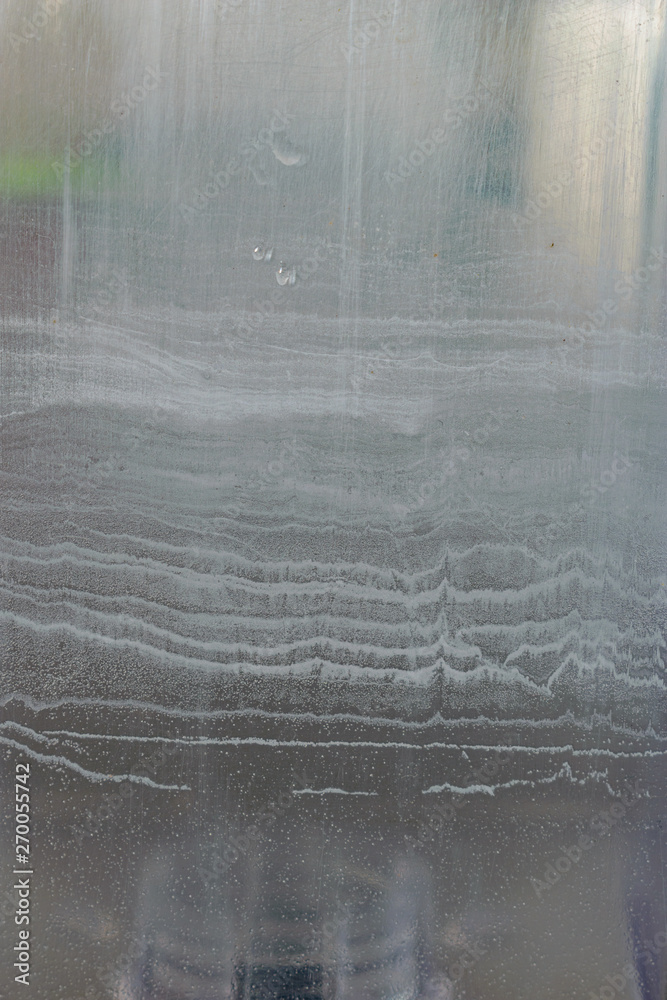 Foto de Limescale on plastic water tank from coffee machine do Stock