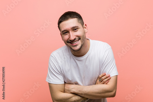 Young casual man laughing and having fun.