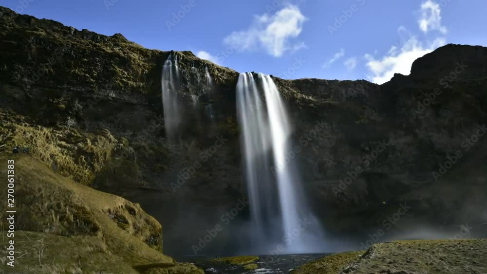 Time lapse shoot of seljalandsfoss waterfall , Iceland waterfall travel nature famous tourist destination Time lapse shoot of seljalandsfoss waterfall , Iceland waterfall travel nature famous tourist destination