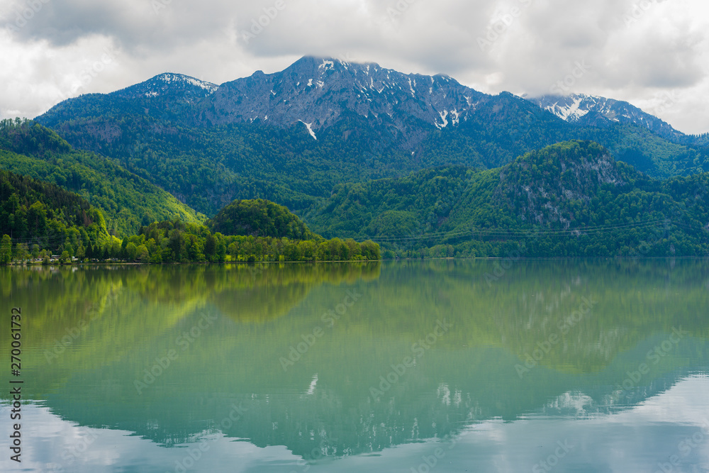 beautiful view on mountain and reflecting water in bavaria