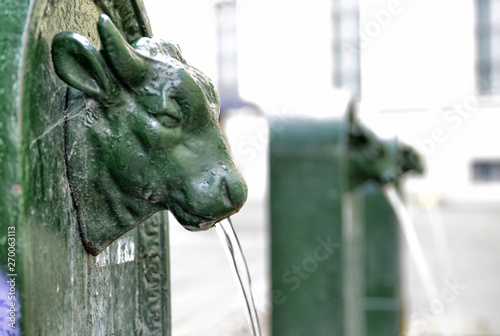 A triptych of drinking water fountains photo