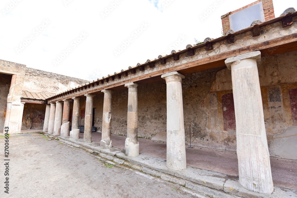 Ancient Buildings with Roman Pillars in Pompeii, Italy