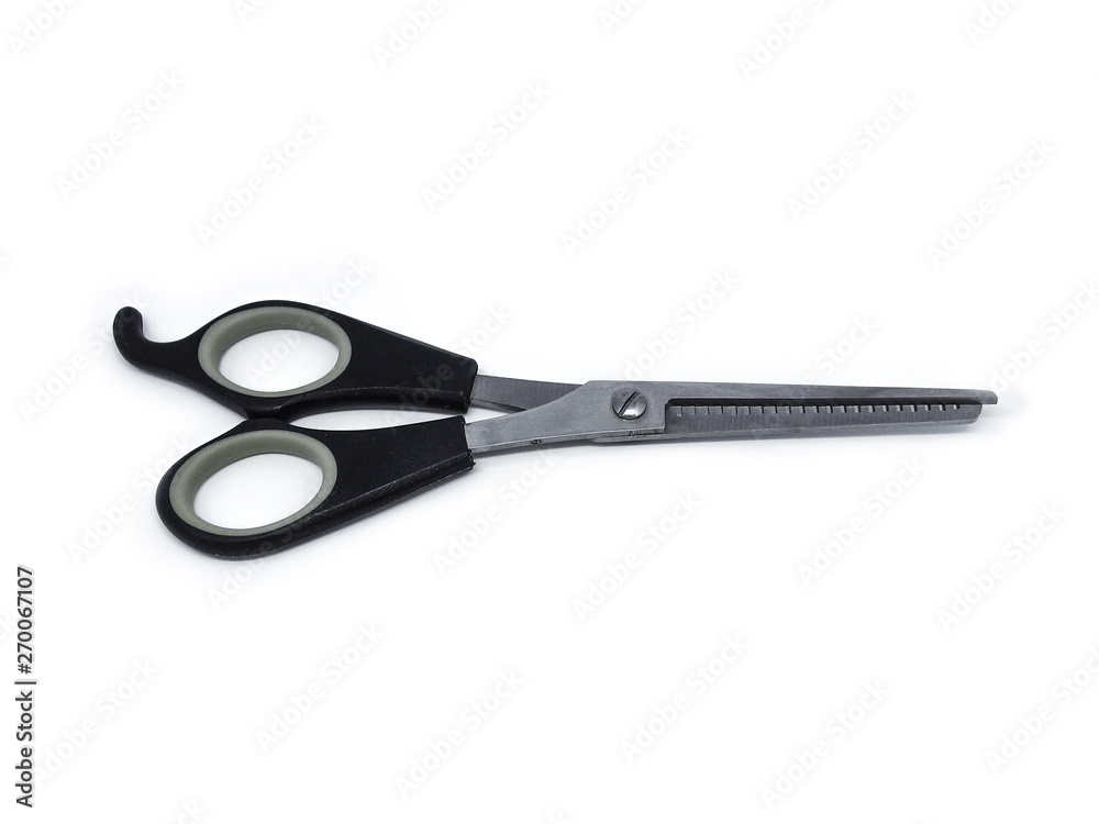 A black plastice handle scissors, hair cut tool on white background. A black plastice handle scissors, hair cut tool on white background.