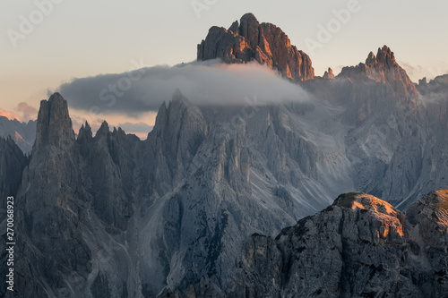 Giant Mountain with a cloud and sunset burn on the tops, italy