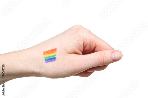 Female hand with drawing rainbow flag and on white background