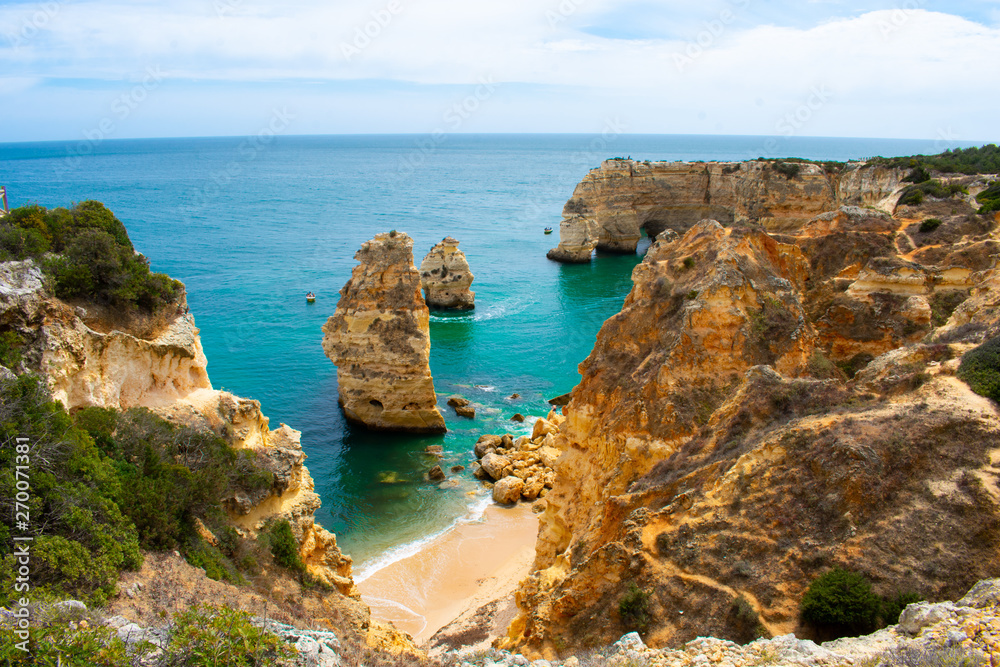 View from above on Praia de Marinha or Benagil, Most beautiful beach in Algarve, Portugal View from above on Praia de Marinha or Benagil, Most beautiful beach in Algarve, Portugal