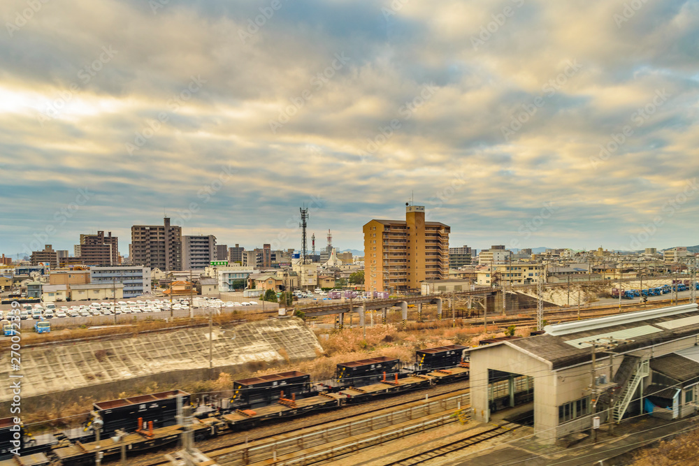 Obraz premium Japanese Urban Scene Train Point of View