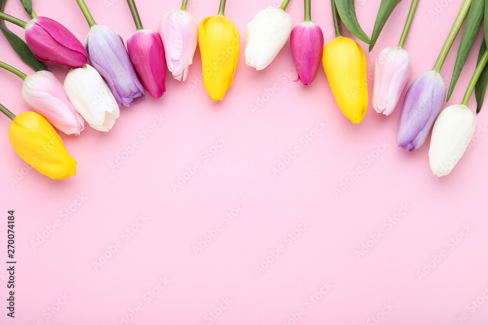Bouquet of tulip flowers on pink background