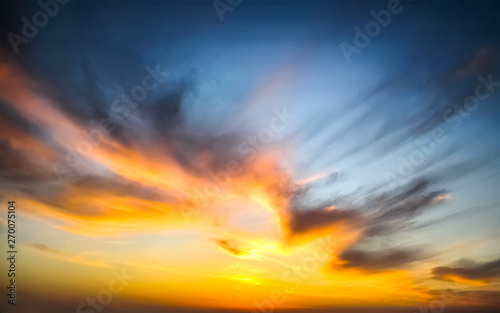 Beautiful epic sunset. Dramatic sunset sky with clouds for background.