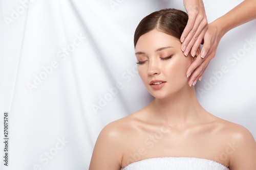 beautician touching woman's face, spa treatment for young and beautiful girl, perfect skin treatment, lovely client of salon