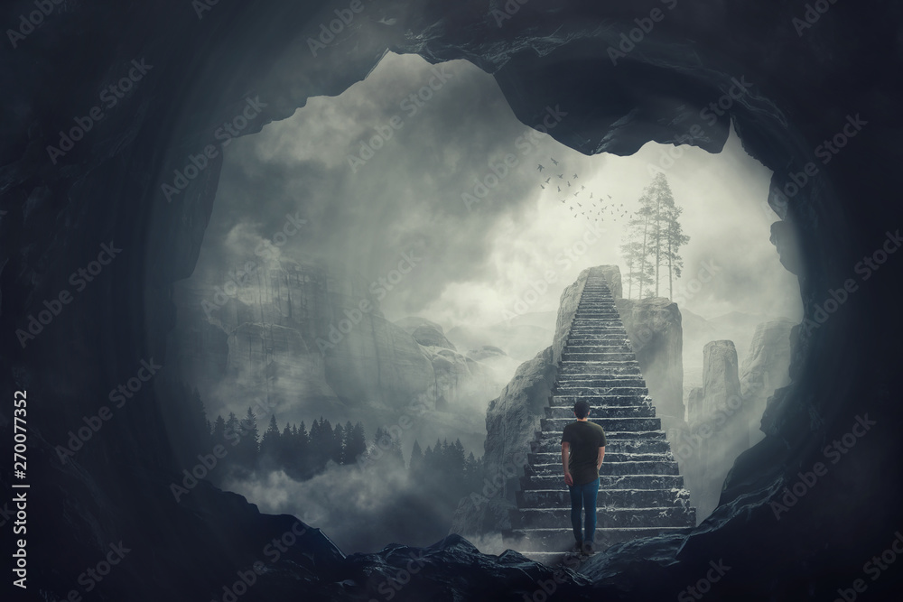 Photo &amp; Art Print Surreal view as a man escape from a dark cave 