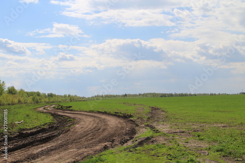 Landscape with a dirt road in Russia