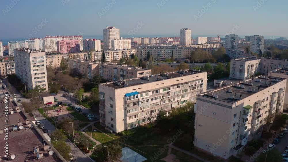 Slow ascending aerial shot, Sevastopol area on the Crimea. Apartement buildings and living. Slow ascending aerial shot, Sevastopol area on the Crimea. Apartement buildings and living.