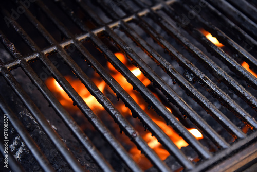 Barbecue grill with flames
