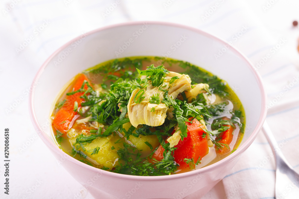 Tasty soup with chicken and vegetables. closeup