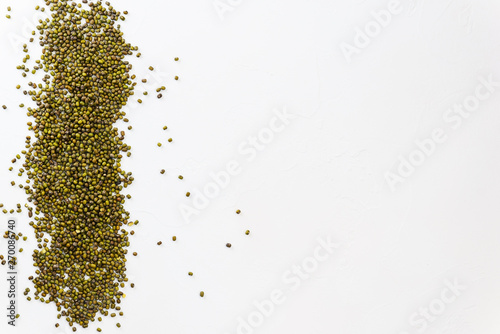 Mash (mung beans) on a white table. Background of mung beans, horizontal orientation
