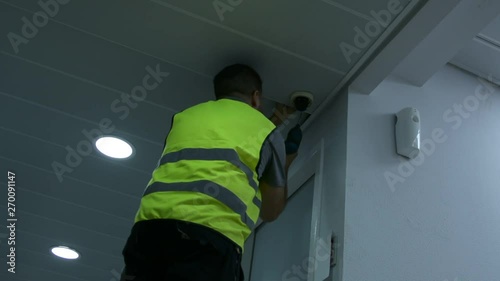 Technicians are installing a wireless cctv camera 
