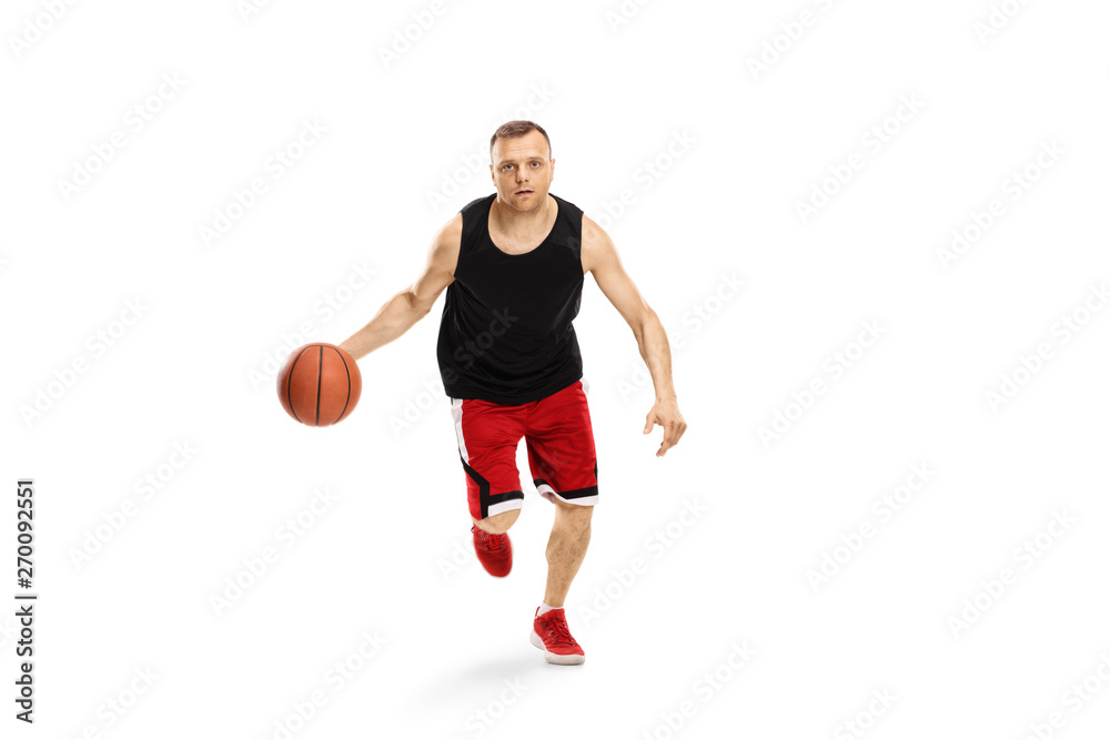 Man running towards the camera with a basketball Man running towards the camera with a basketball