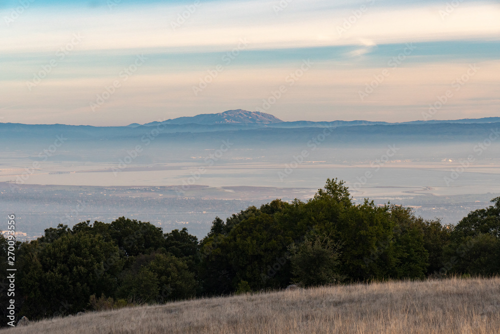 Sunset on silicon valley as seen from the top of Monte Bello open space above Palo Alto, California