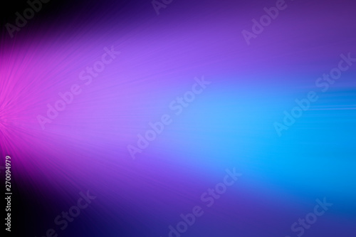 Pink and blue completely blurred wide beam of light on a black background