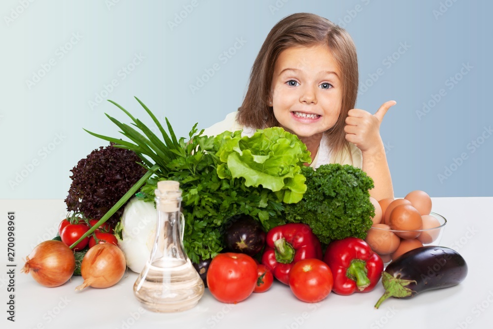 Portrait of adorable little girl preparing healthy food at kitchen Portrait of adorable little girl preparing healthy food at kitchen