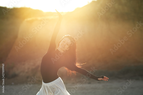 Принти на полотні Ballet woman Dancer at Sunset beach