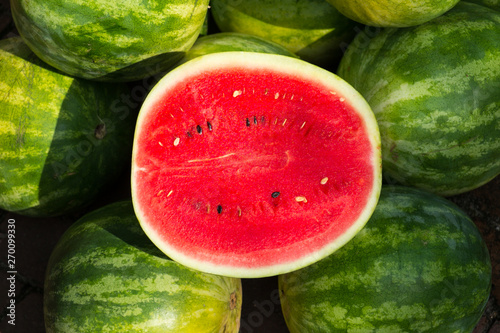 Fruit stand in the summer, ripe watermelon photo